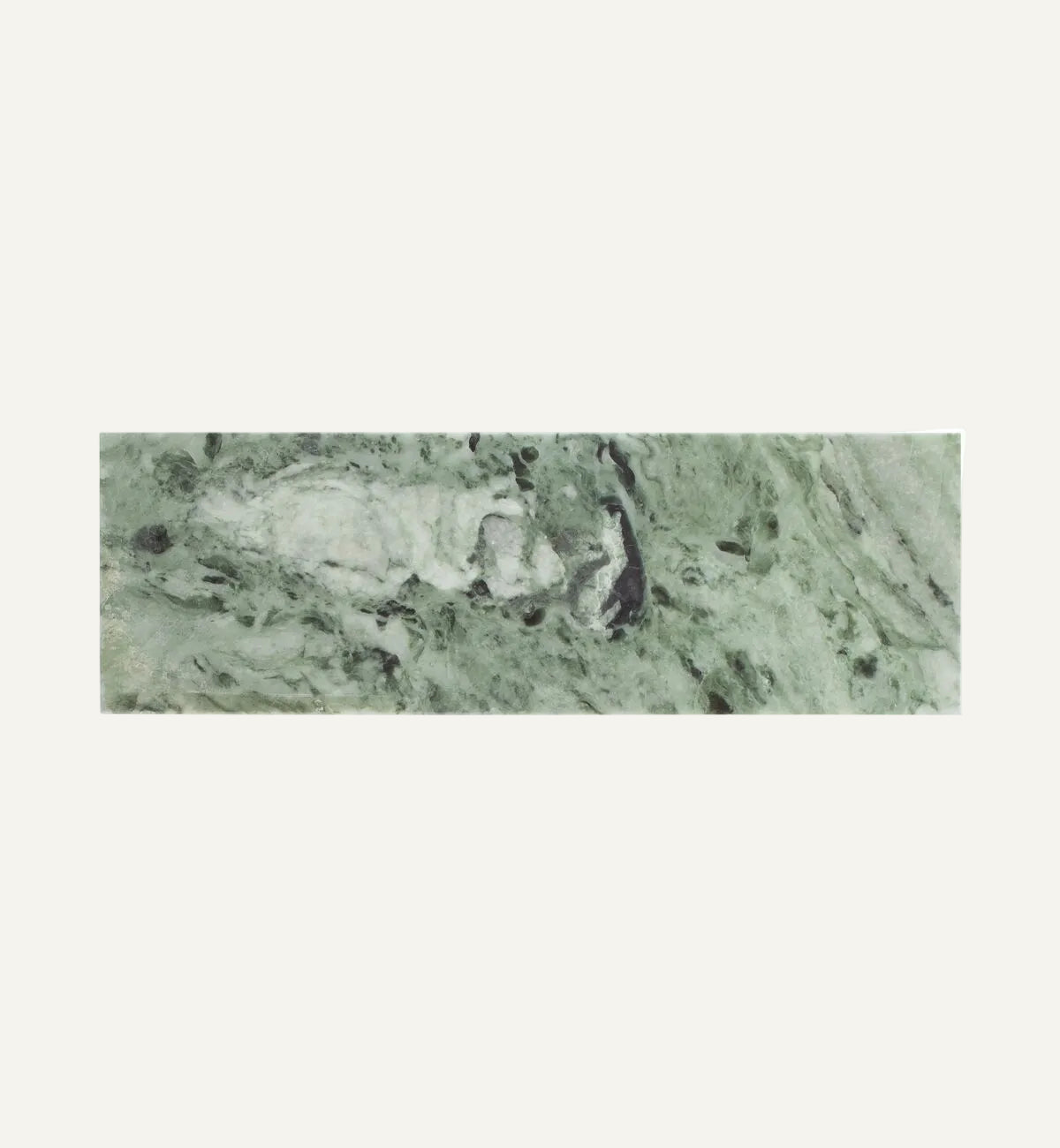 Green marble tile with a subtle pattern on a white background